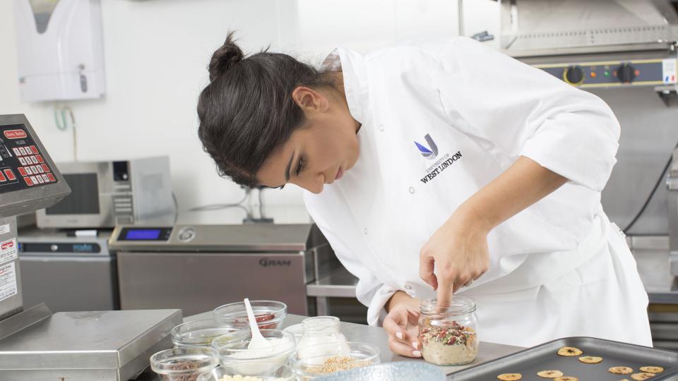 A lab technician prepares food to be analysed at the West London Food Innovation Centre