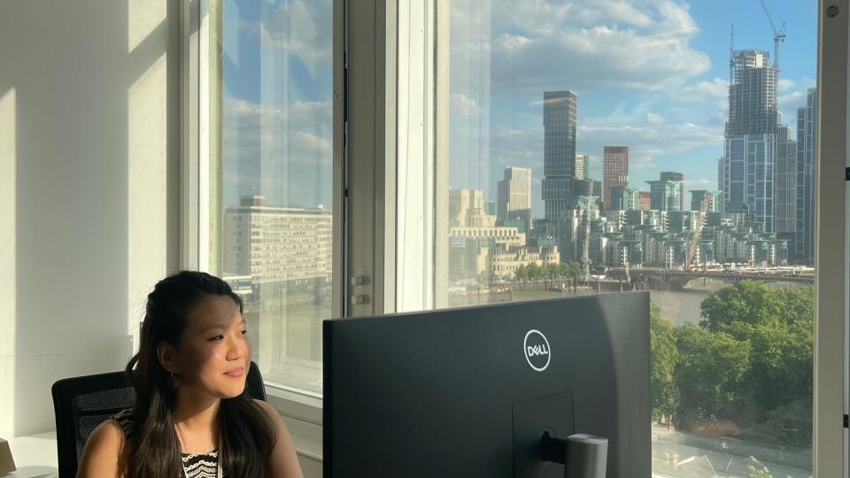Business student Jenny Sherpa sat at her desk at her internship with B4B