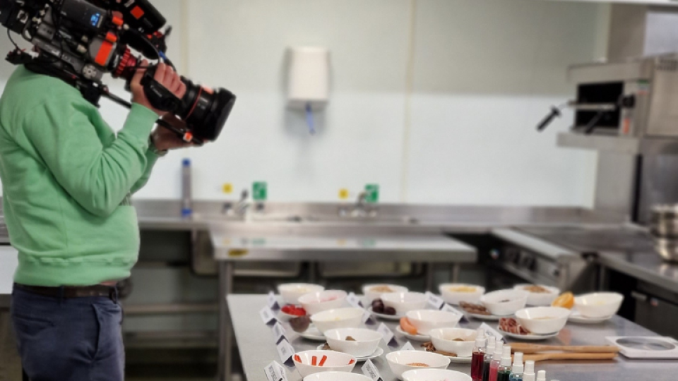 A camera operator filming for The Apprentice at the University of West London's Food Innovation Centre