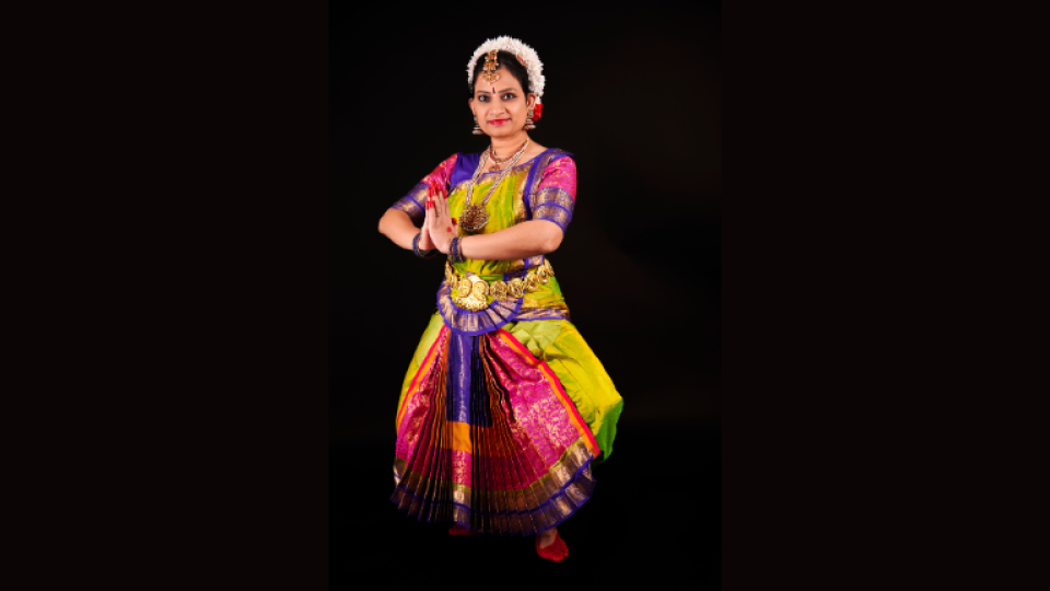 ARTSFEST Photography work created by Emma Cardoso entitled "Rhythms of India" showing a female dancer in a detailed vibrant costume.