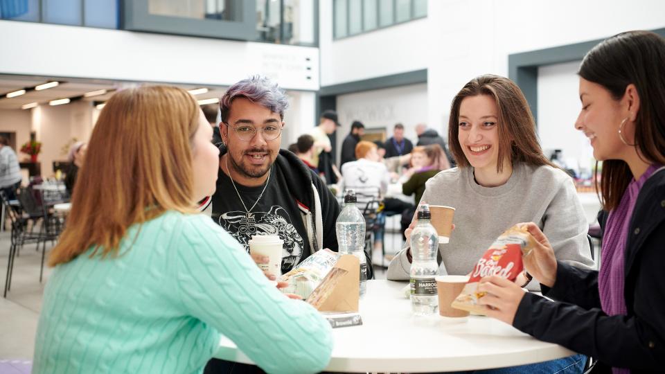 Group of students around a table