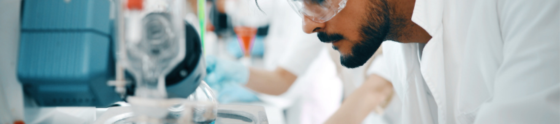 student in goggles in the lab