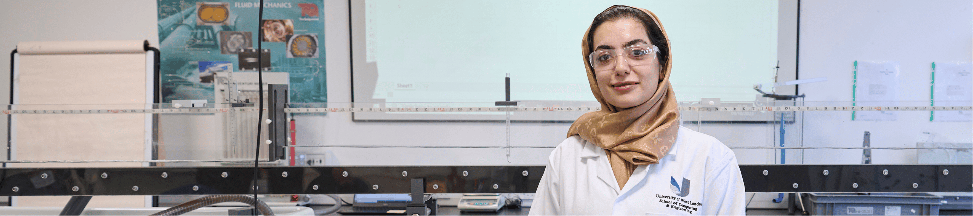 A female student working in an engineering lab at the University of West London