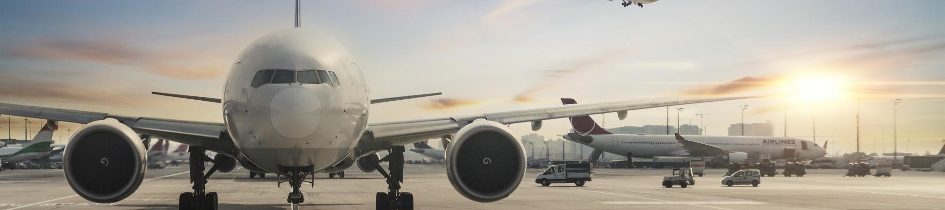 Planes on the runway and in the sky